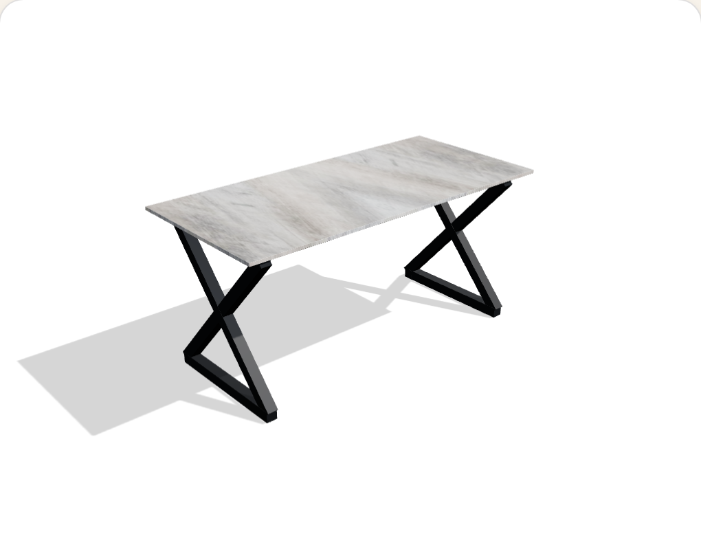The Workshop desk — grey concrete-look top on crossed black steel trestle legs